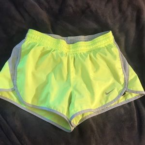 Yellow Nike dri-fit athletic shorts